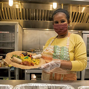 My name is Mulu. I am from Eritrea, located in East Africa. I have called the beautiful state of Vermont home since 2006, where I live in South Burlington with my family. I love cooking- it’s my passion. I have been cooking and serving for many events; pop up dinners, catering, farmer markets and cooking classes in Burlington and the greater Burlington area. I offered Cooking Classes at City Market, with Burlington Parks, Recreation and Waterfront and the O’Brien Community Center.